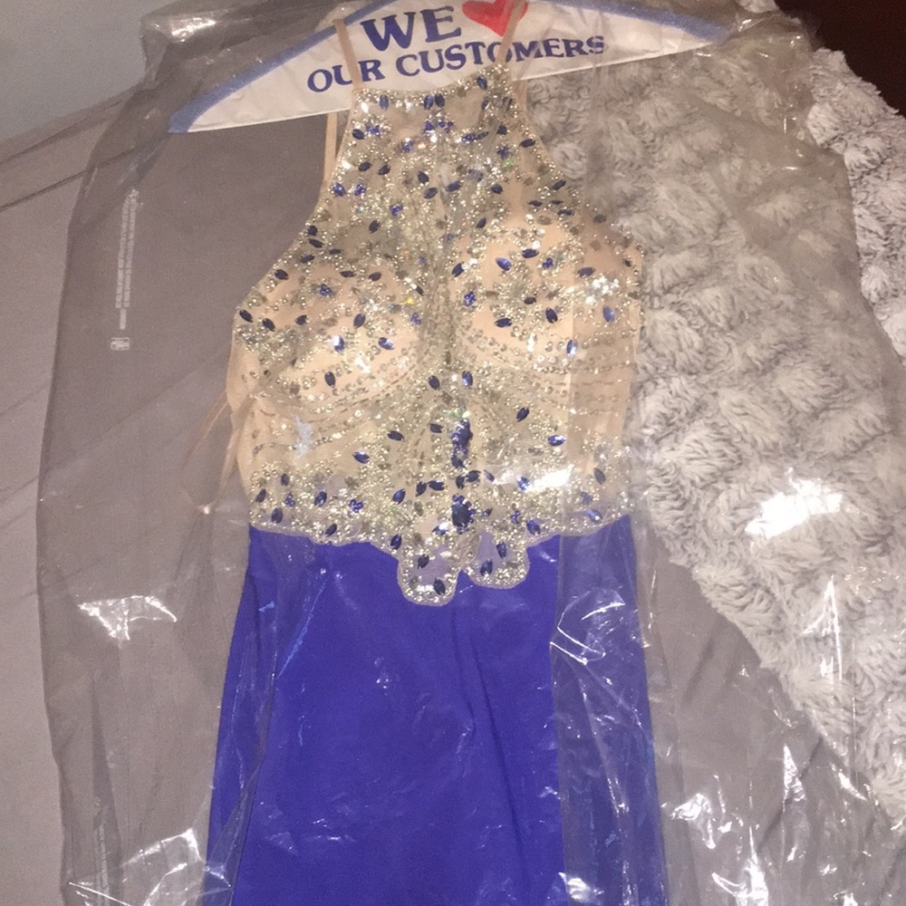 Royal blue prom dress embedded with jewels on top